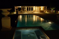 The pool lit up at night.